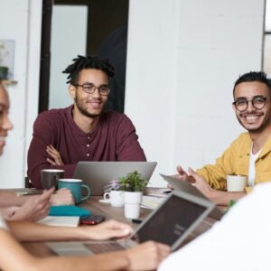 A group of professionals collaborating in a modern office setting.